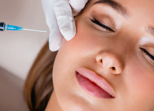 Photo of a woman receiving facial injections with PRF